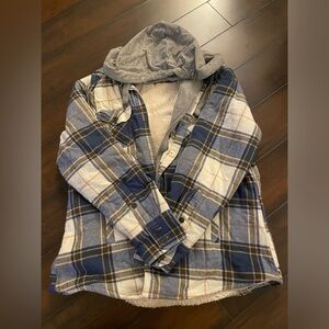 thick hooded flannel jacket. zipper on front with warm fuzzy material inside